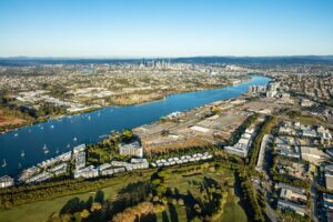 Brisbane needs an underground: aerial view of Northshore Hamilton on the Brisbane River with the CBD skyline