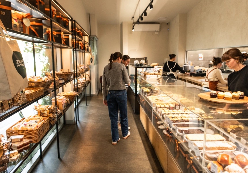 Customers browsing the cake counter at Jocelyn's Provisions Albion