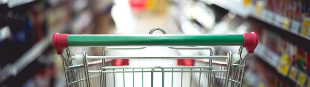 Shopping trolley in a supermarket aisle, illustrating the Fortitude Valley Woolworths ranking