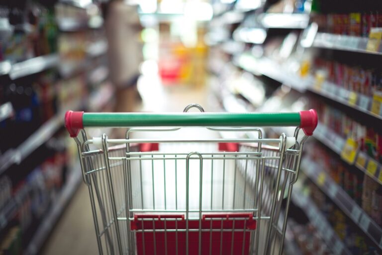 Shopping trolley in a supermarket aisle, illustrating the Fortitude Valley Woolworths ranking